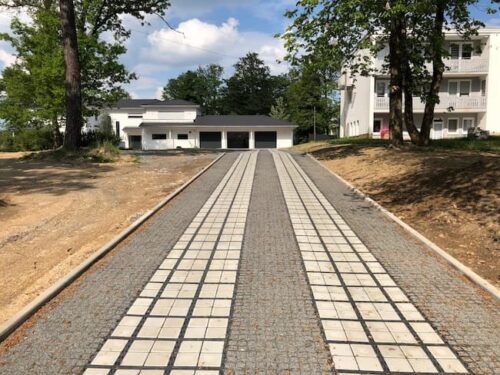 permeable paving residential driveway with different colour inserts for a unique look