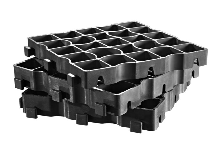 Stacked ECORASTER E50 heavy-duty permeable grid panels.